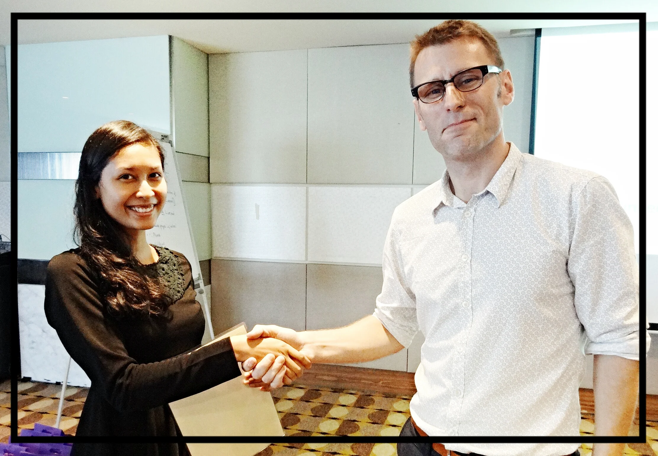 Syuhida Md Silmi (Senior Executive of Malaysian Green Technology Corporation ) receiving her certificate of workshop completion from Julio Romo (Zanerva Partner Consultant)