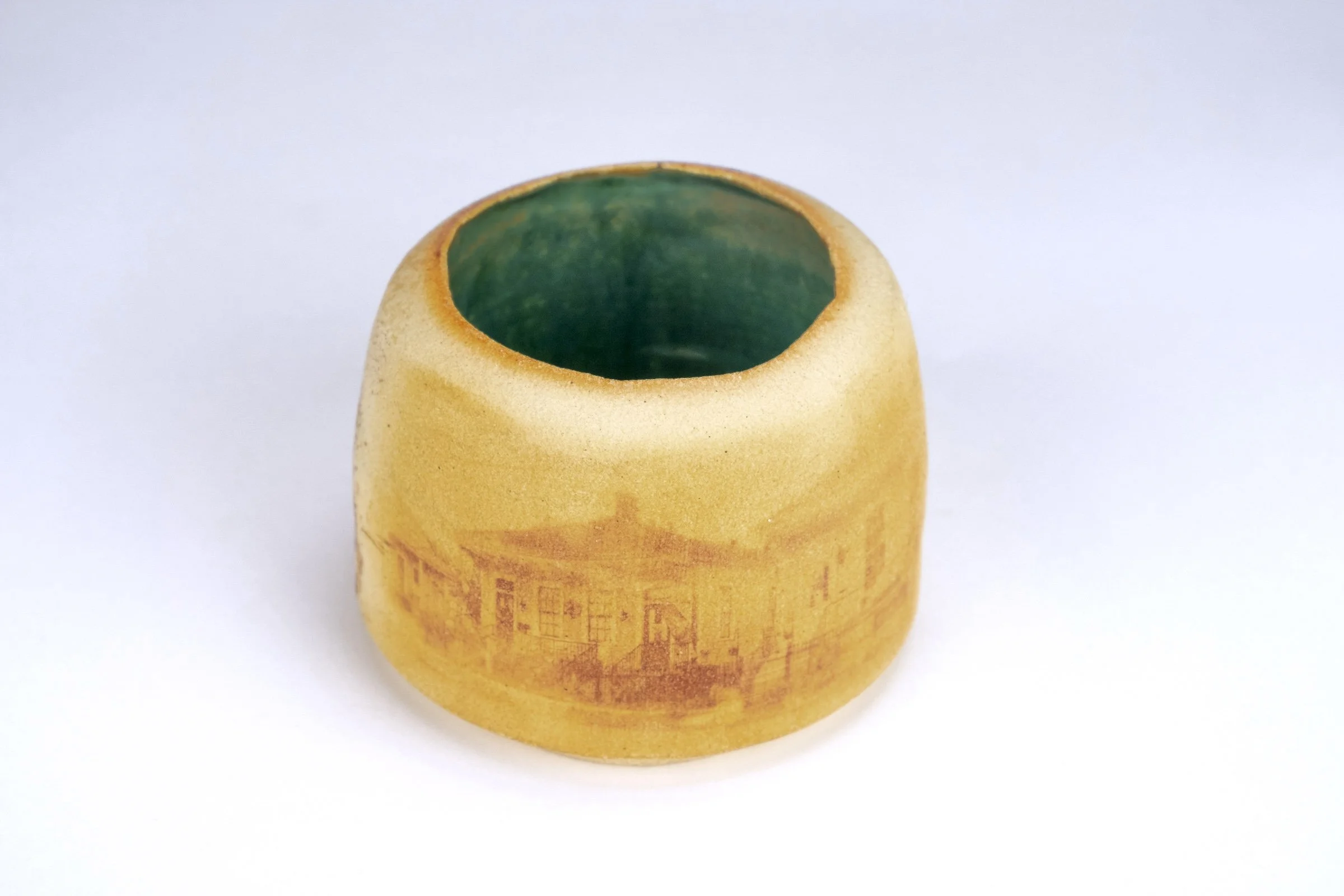 Cyanotype decorated pot with street seen