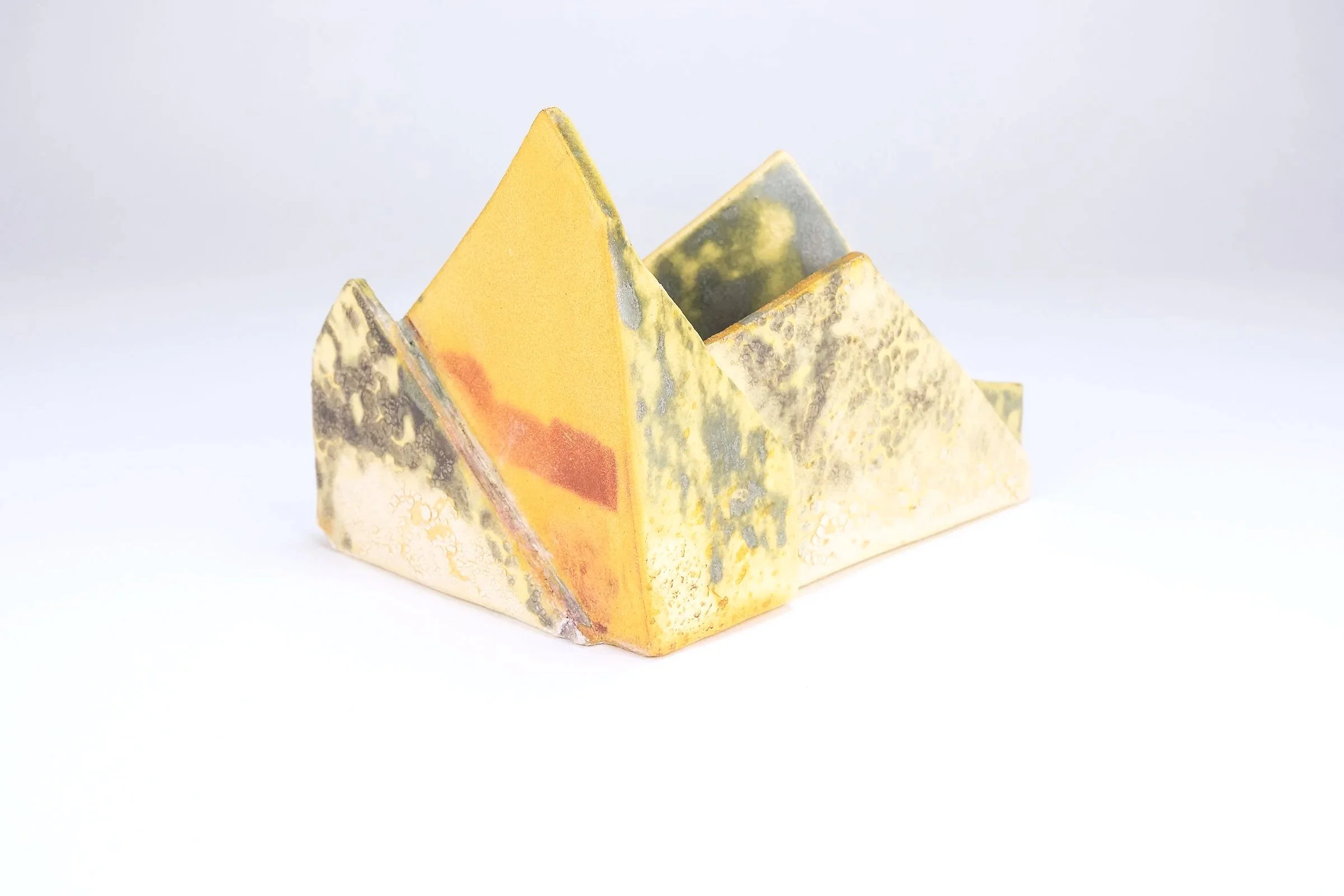 Shifting Memories No.3  2024
Stoneware, cyanotype on clay, glaze, and wax. 
6"h x 6"w x 4" d