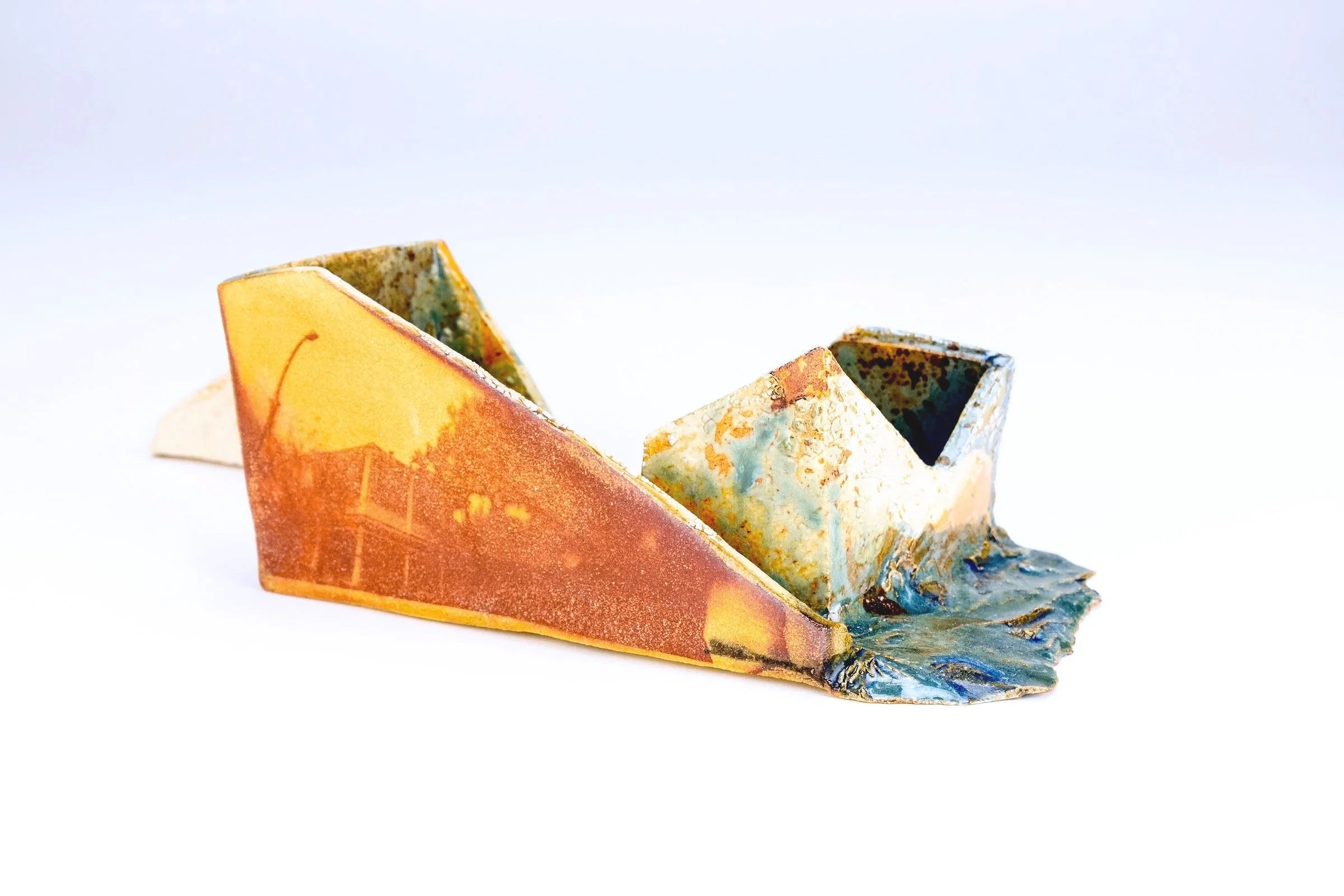 Shifting Memories No.7  2024
Stoneware, cyanotype on clay, glaze, and wax. 
6"h x 8"w x 5" d