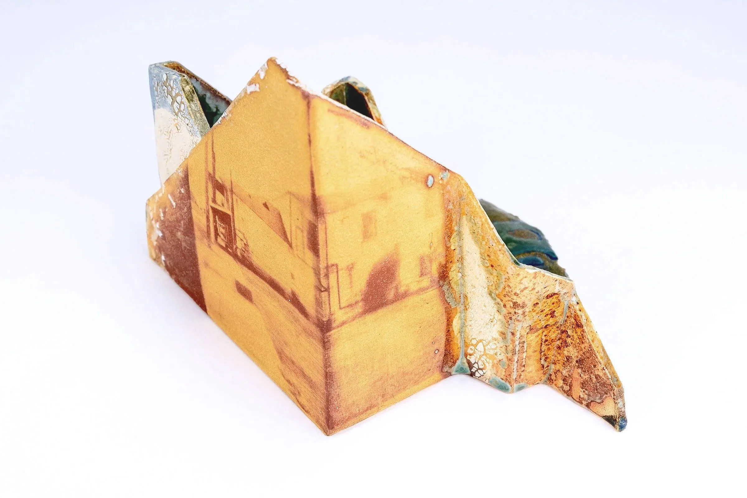  Shifting Memories No.6  2024
Stoneware, cyanotype on clay, glaze, and wax. 
8"h x 6"w x 5" d