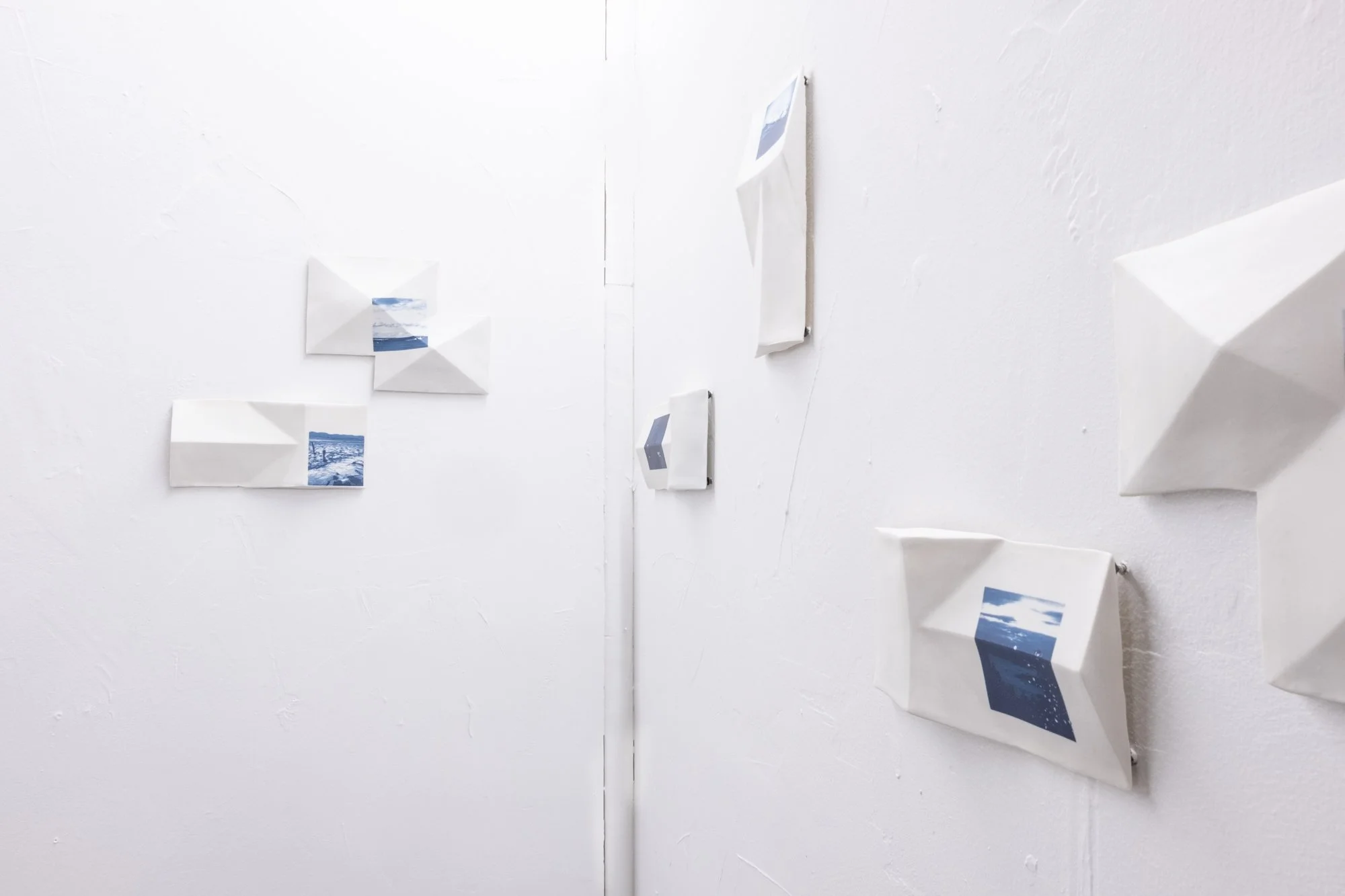 All the Places I (Be)Long 2026. Porcelain and On-Glaze Cobalt Photographic Decals. 
Detail Image.

26” h x 480”w x 1” 