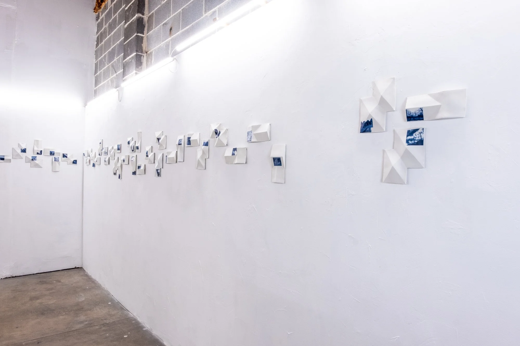 All the Places I (Be)Long 2026
Porcelain with Cobalt on-glaze Photographs.
26” h x 480”w x 1” d