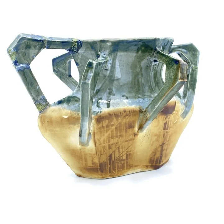 Construction/Deconstruction: Reflections on the World No. 3
2025
Slip-cast porcelain, cyanotype photographs, glazes, and wax. 
9”h x 14”w x 8”d 