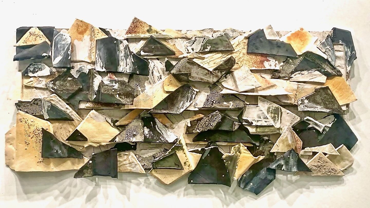 Chaos and Control. 2024.
Ceramic stoneware, Glaze, Hardie-board, and Raw Clay. 
25”h x 48”w x 6”d
