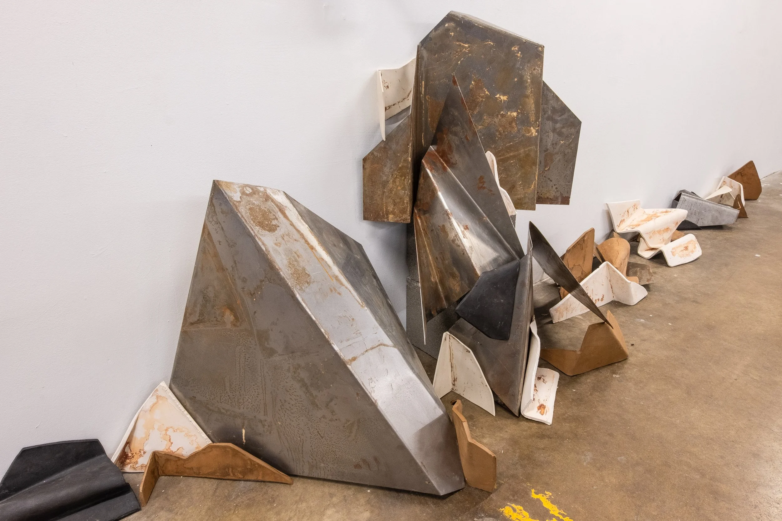 Folded 2025 (Detail)
Ceramic Stoneware, Steel and Rust.
Sizes variable depending on installation:
Pictured 60"h x 72"w x 10"d