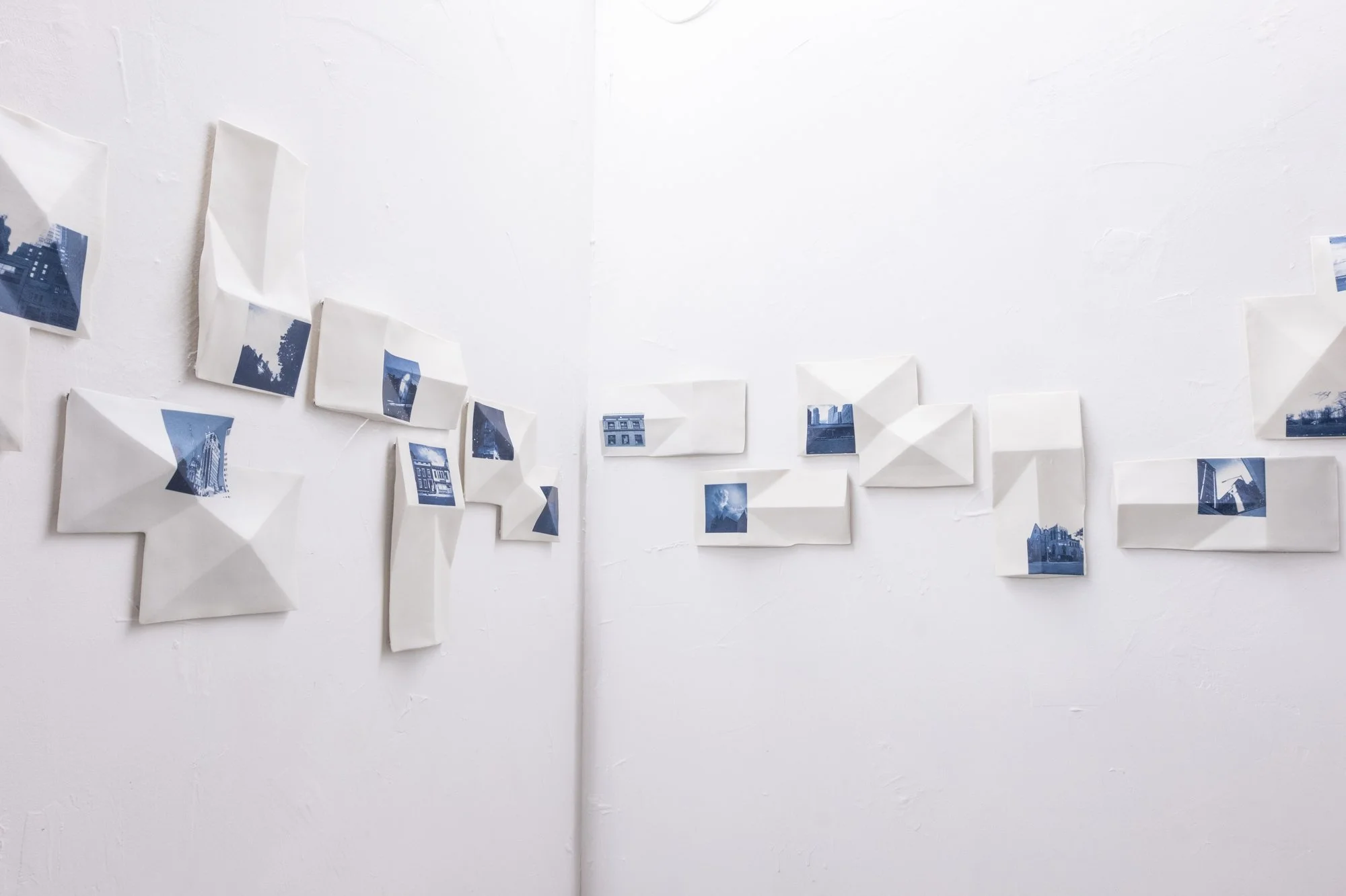 All the Places I (Be)Long 2026. Porcelain and On-Glaze Cobalt Photographic Decals. 
Detail Image.

26” h x 480”w x 1” 