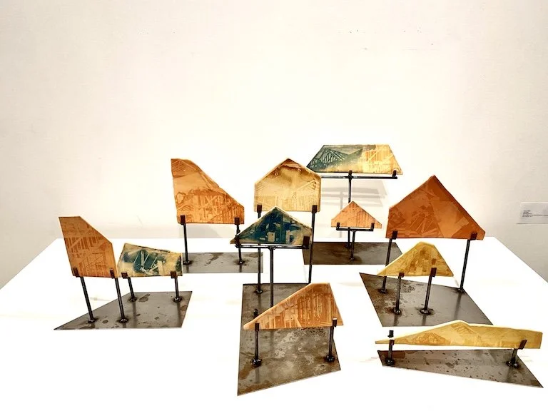 Proof 2024
Ceramic with cyanotype photography on clay, wax and steel.
12”h x 34”w x 22”d 