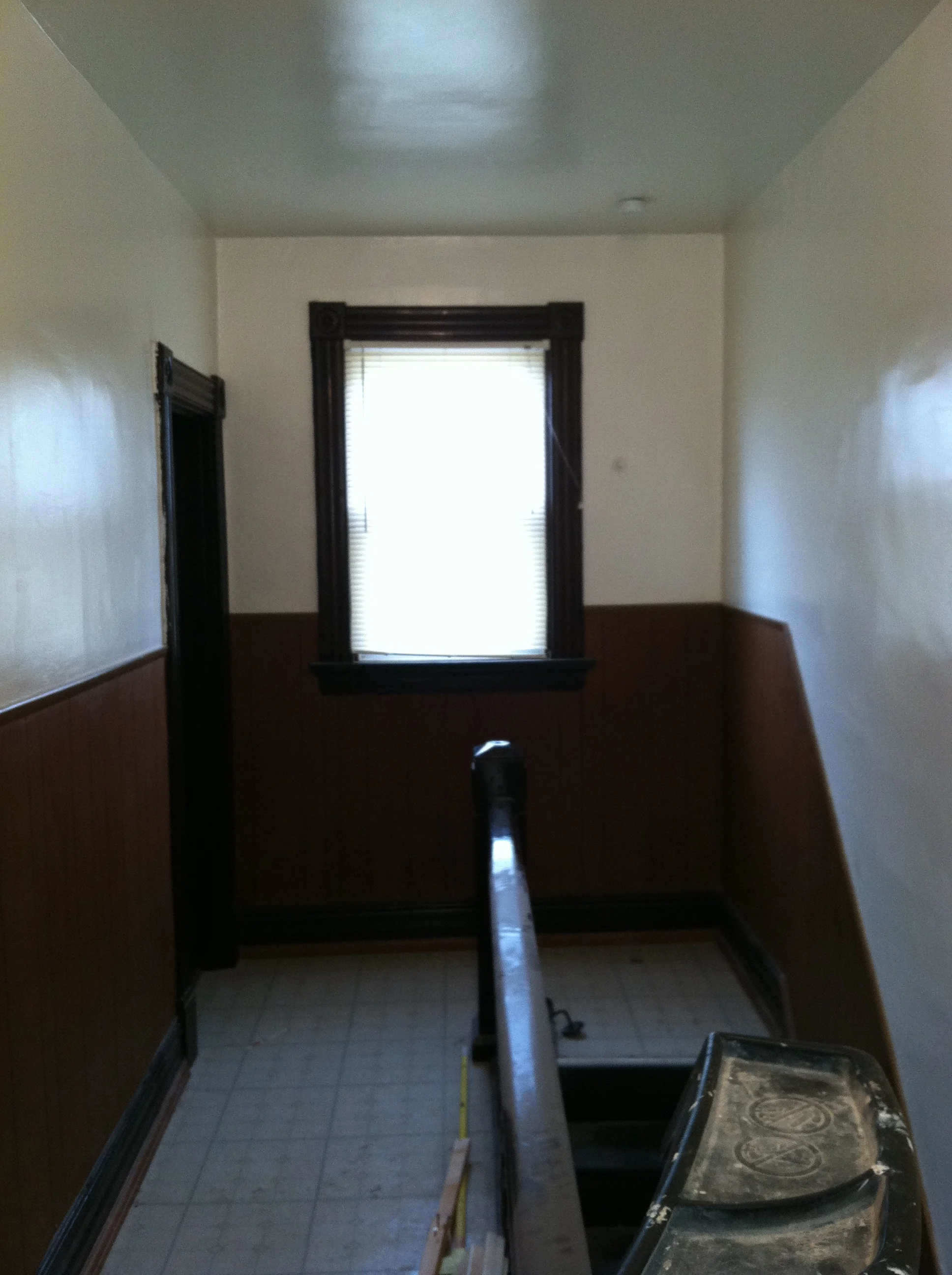 This is the hallway of the 3rd floor apartment. Bathroom on left. 