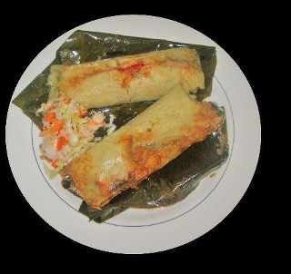 tamales wrapped in banana leaves