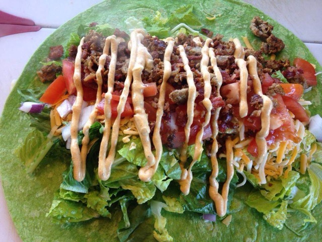 Rip City Wrap.$7.75. Blackend steak, crispy bacon, romaine, tomatoes, onions, cheddar/jack cheese , and Cajun aioli