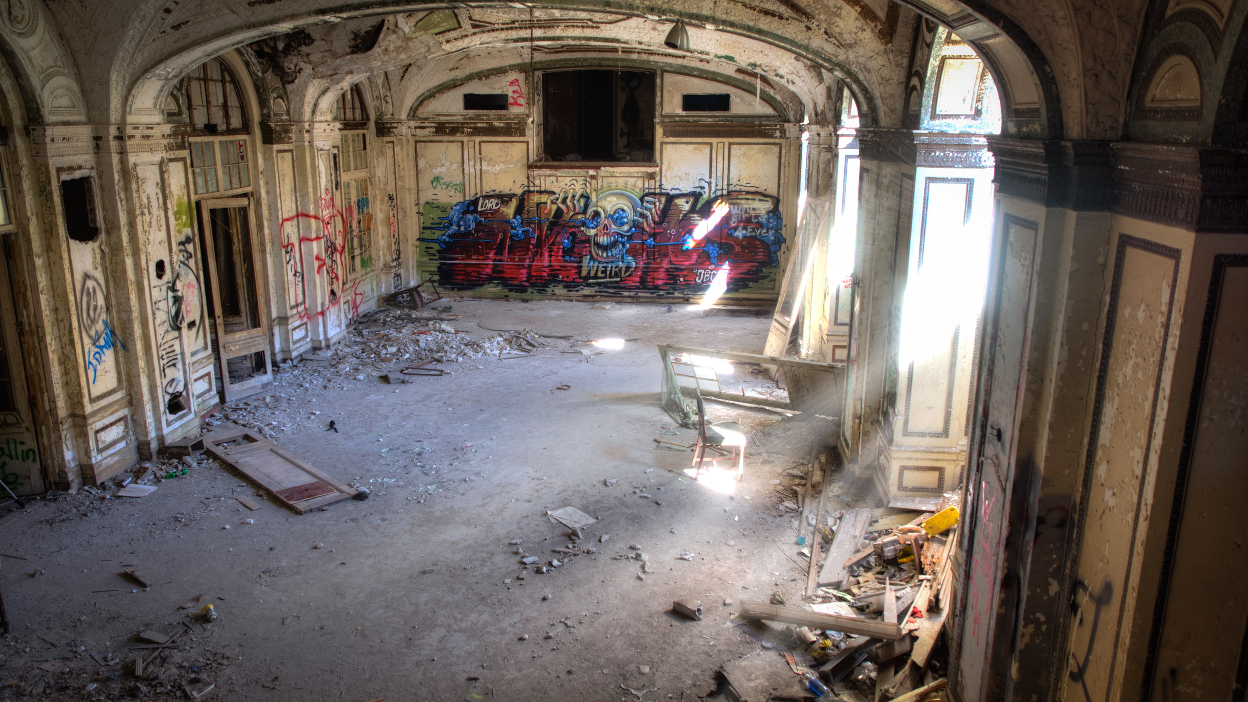The ground floor of the Lee Plaza Hotel contains this once elegant ballroom which played host to countless social gatherings and endless nights of entertainment. It now plays host to urban explorers and artists armed with spray cans.