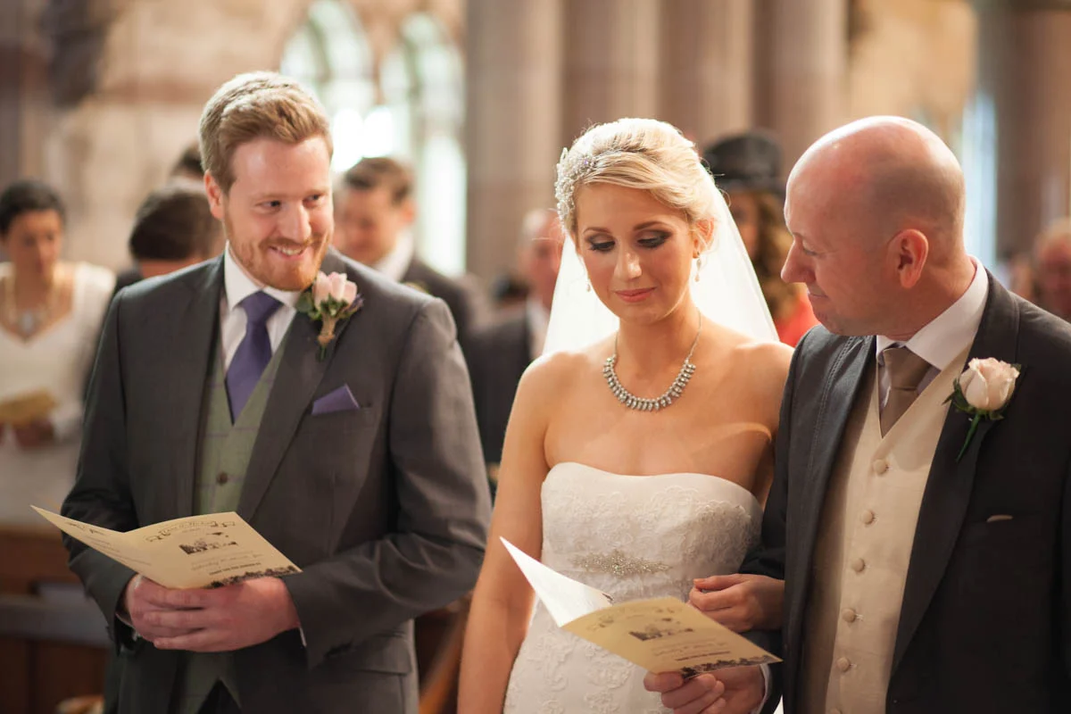A Groom Shares a Glace with his Brides Father.jpg