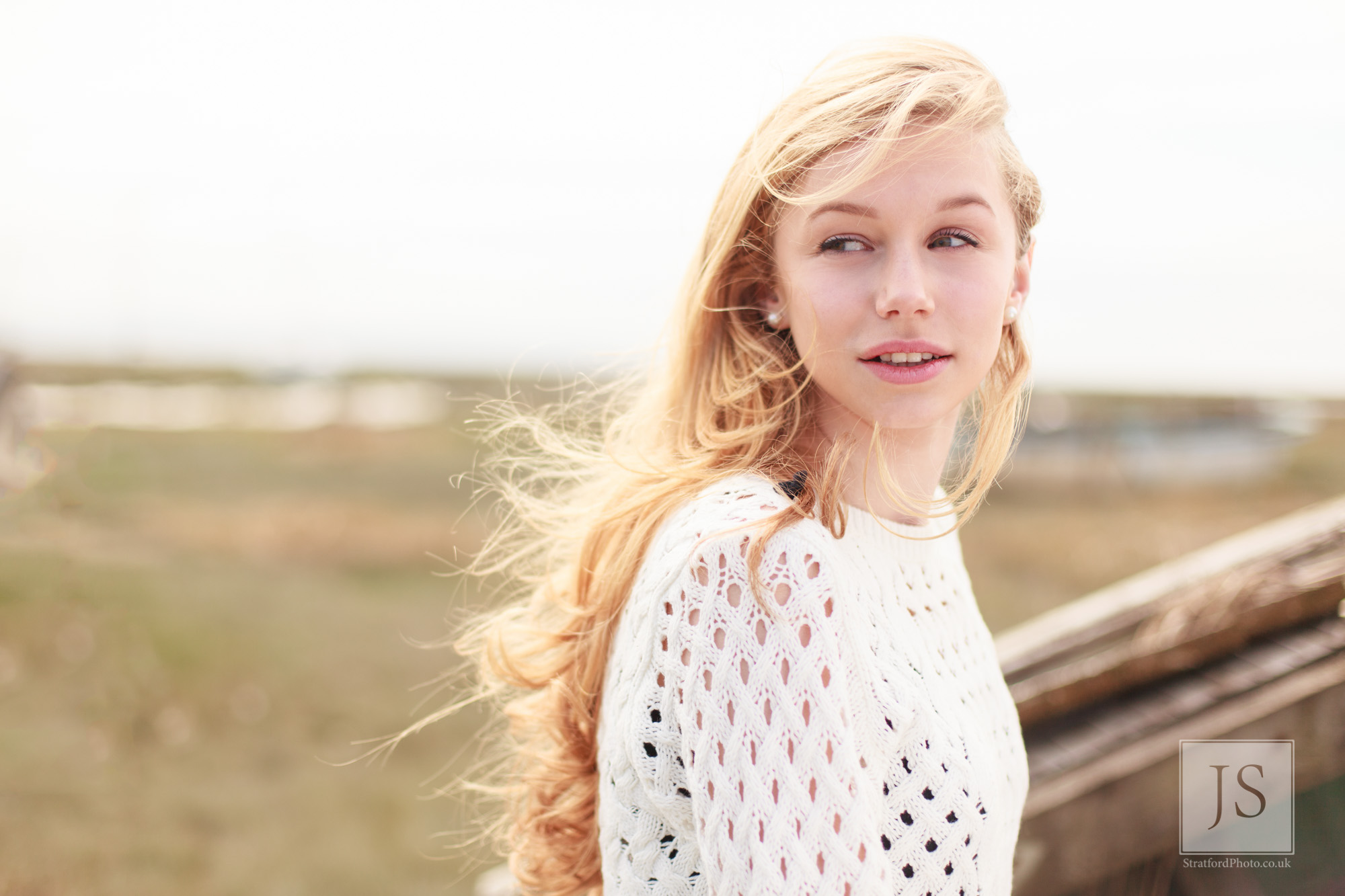 A girl looks on in the sun at Hoylake Beach.jpg