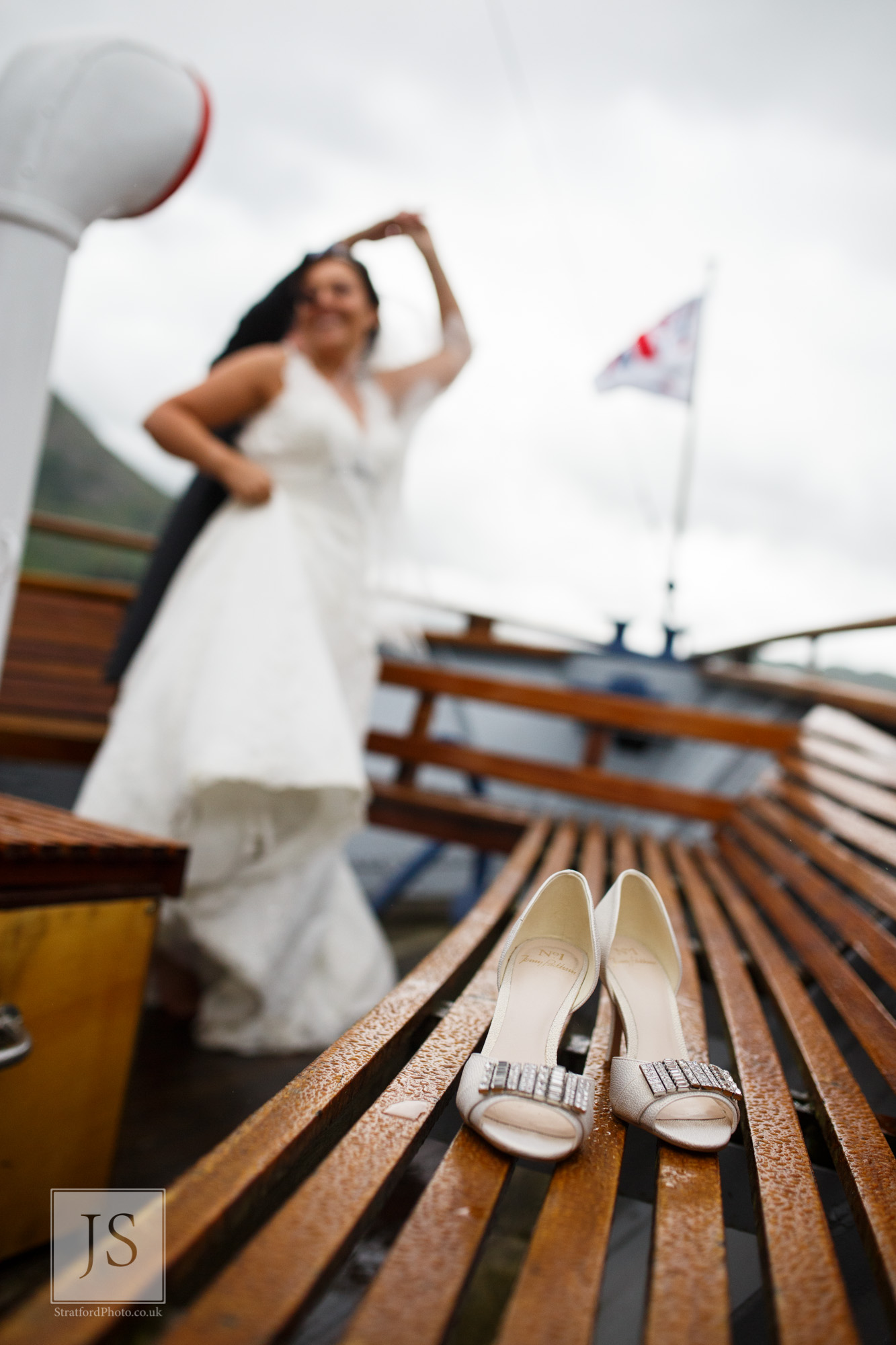 A bride and groom dance together on a Lake Ullswater steamer boat.jpg