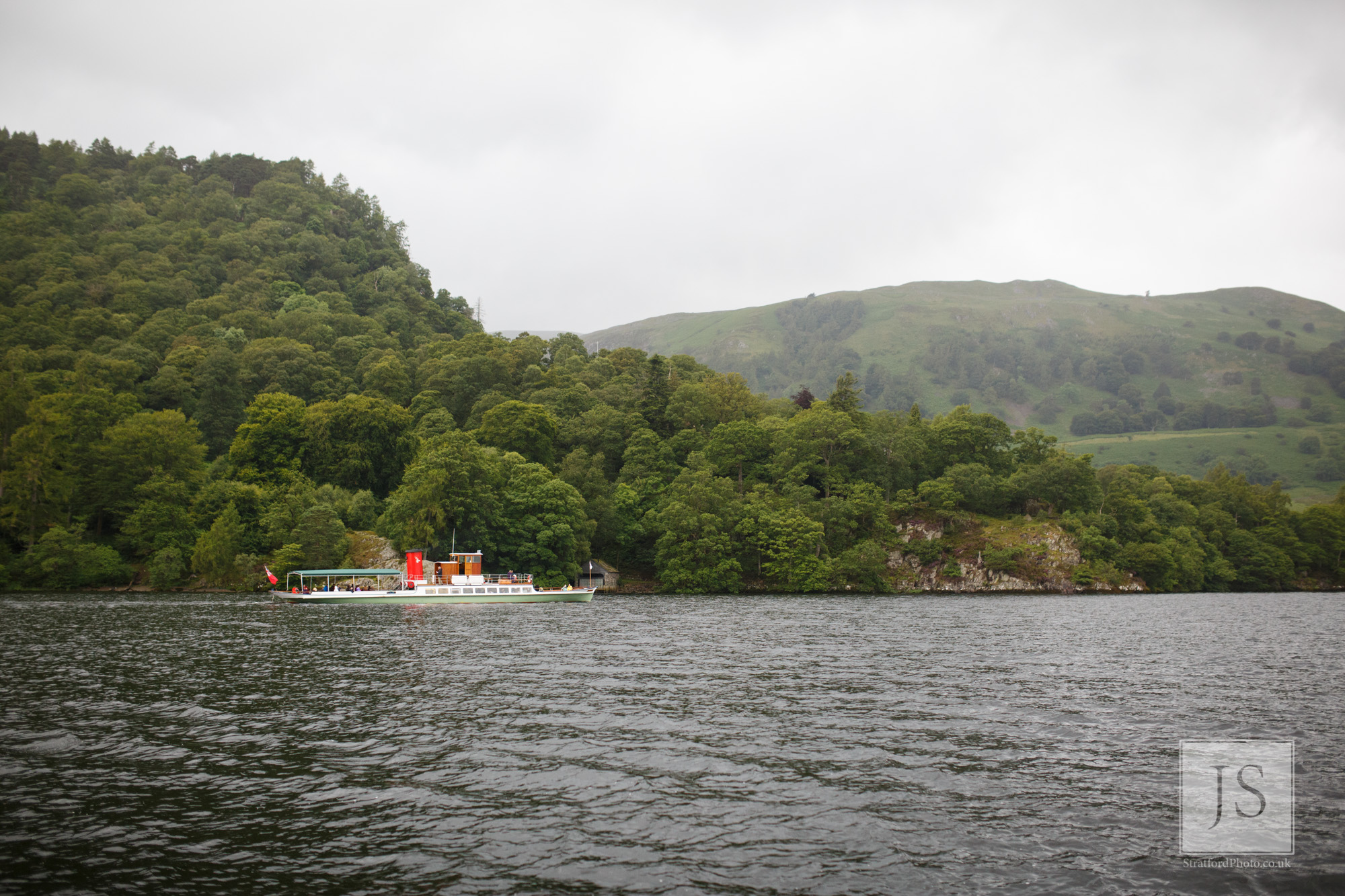 A steamer boat sails around Lake Ullswater.jpg