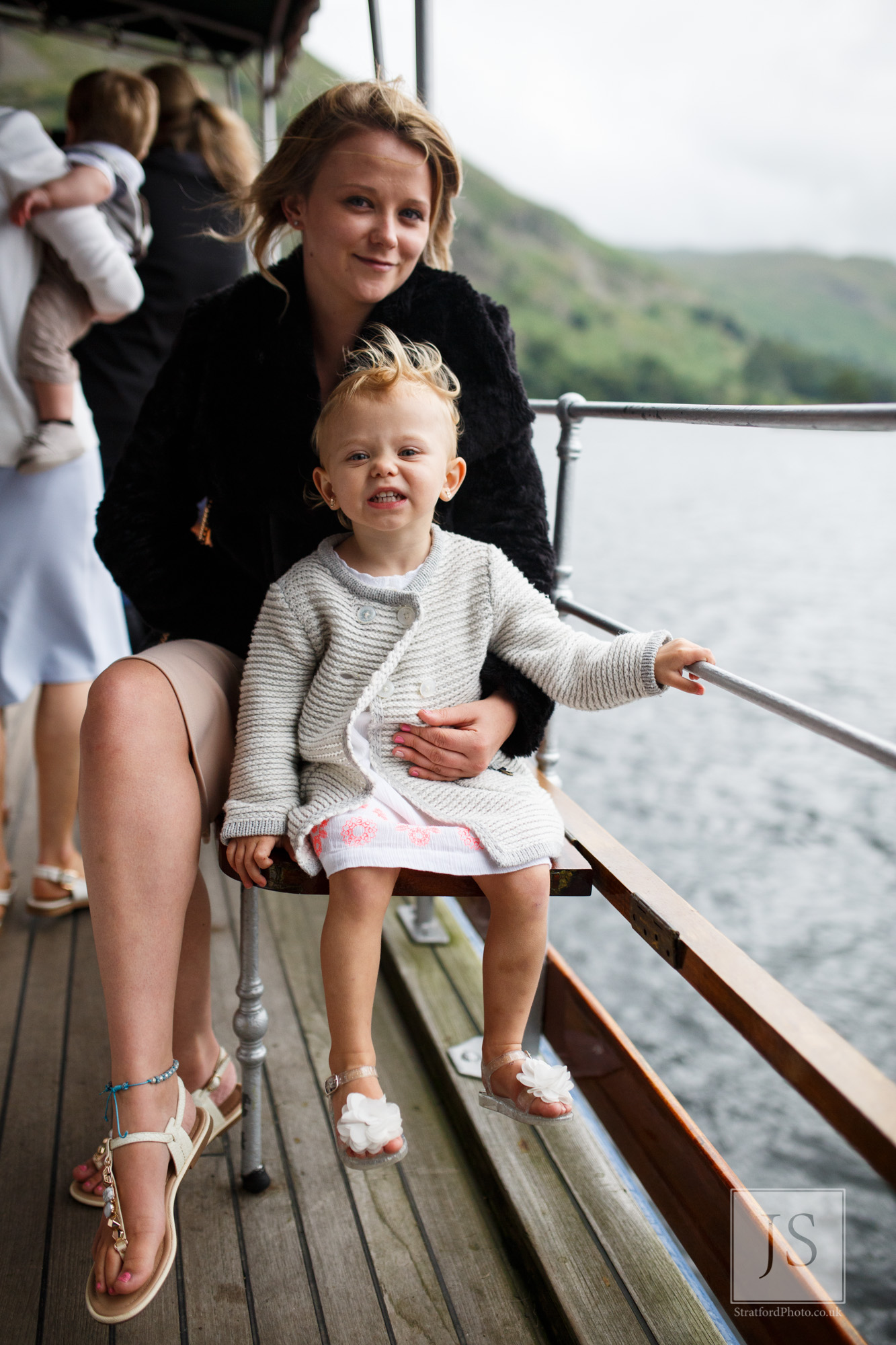 A young mother and child enjoy Lake Ullswater from a boat.jpg