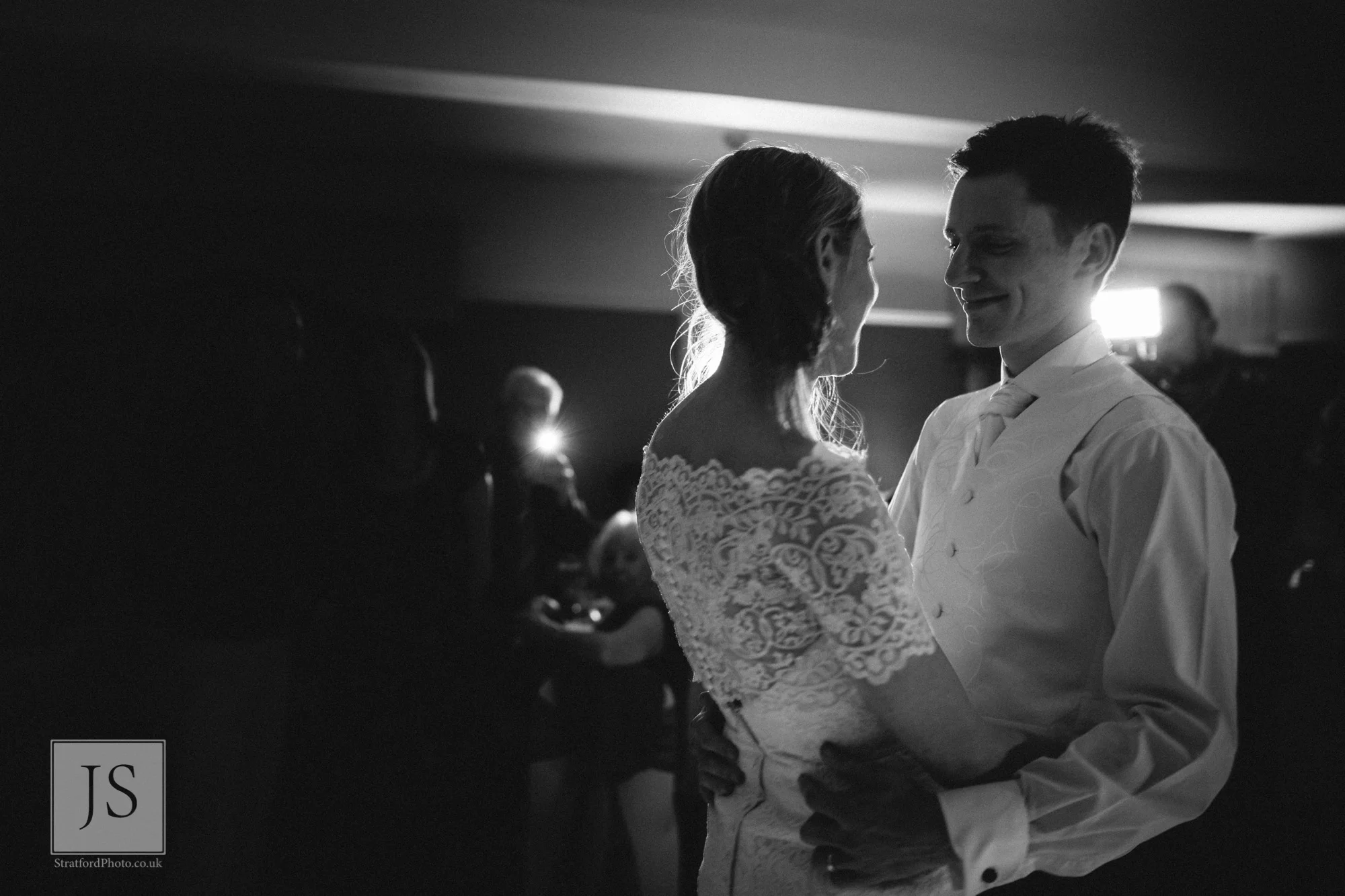 A bride and groom share their first dance.jpg