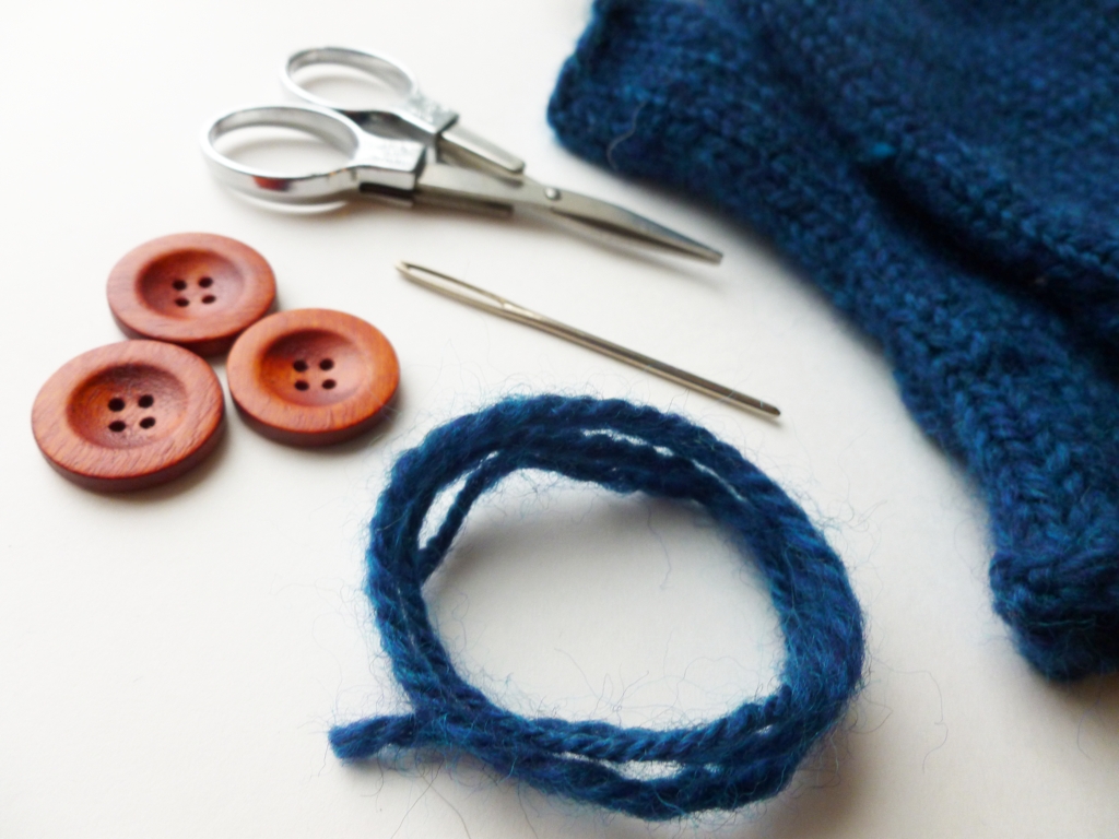 How to Sew on a Button with Handspun Yarn | withwool.com