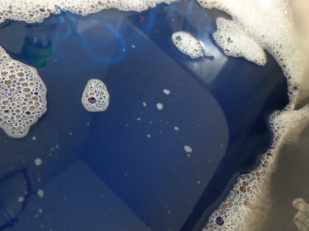 Washing-Excess-Dye-From-Yarn.jpg