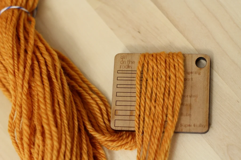 Got a fresh skein of handspun yarn off the bobbins or spindle? Heres a different way to measure wraps per inch. | withwool.com