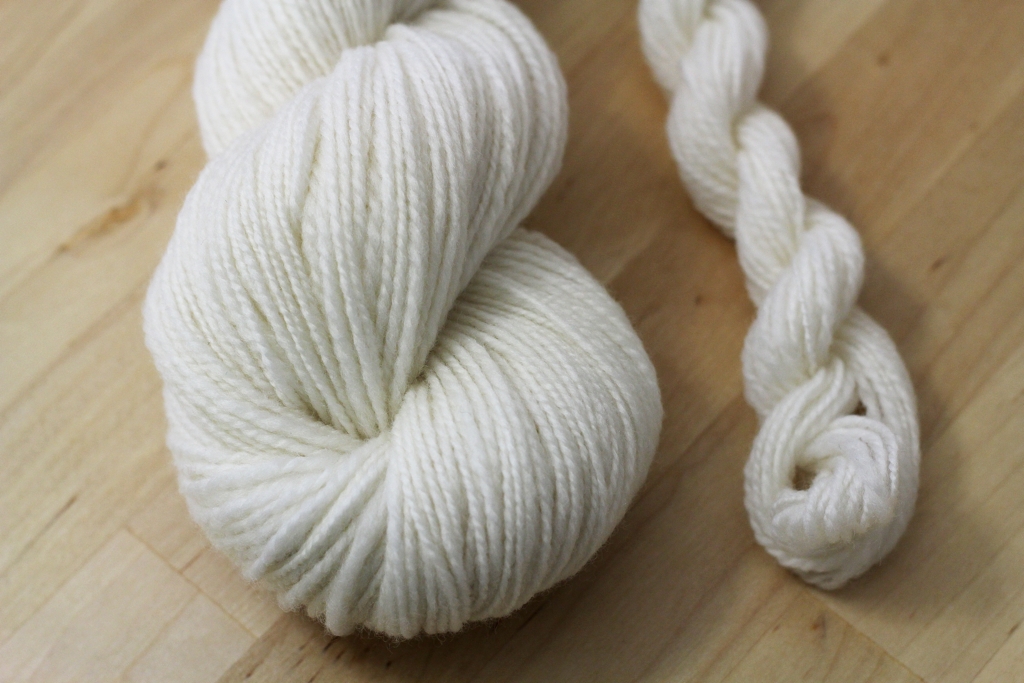 My first handspun skeins of cashmere! The mama skein is about 240 yrds and mini is about 25 yrds. Cashmere is as soft as everyone says it is, and here's how I turned 2 oz of it into yarn. | Notes About Spinning Cashmere - withwool.com