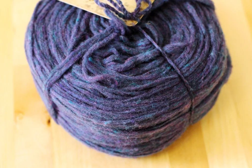 Pencil roving can be spun, knit, or woven into beautiful things. This review gives a head to head comparison of 2 different pencil rovings, Noro Rainbow Roll and Imperial Bulky 2-Strand. | Review: Comparing Noro Rainbow Roll and Imperial Yarn Bulky 2-Strand Pencil Roving