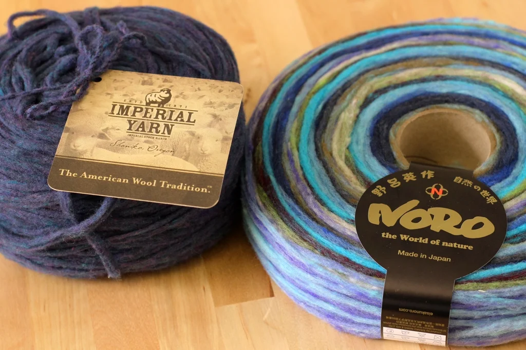 Pencil roving can be spun, knit, or woven into beautiful things. This review gives a head to head comparison of 2 different pencil rovings, Noro Rainbow Roll and Imperial Bulky 2-Strand. | Review: Comparing Noro Rainbow Roll and Imperial Yarn Bulky 2-Strand Pencil Roving