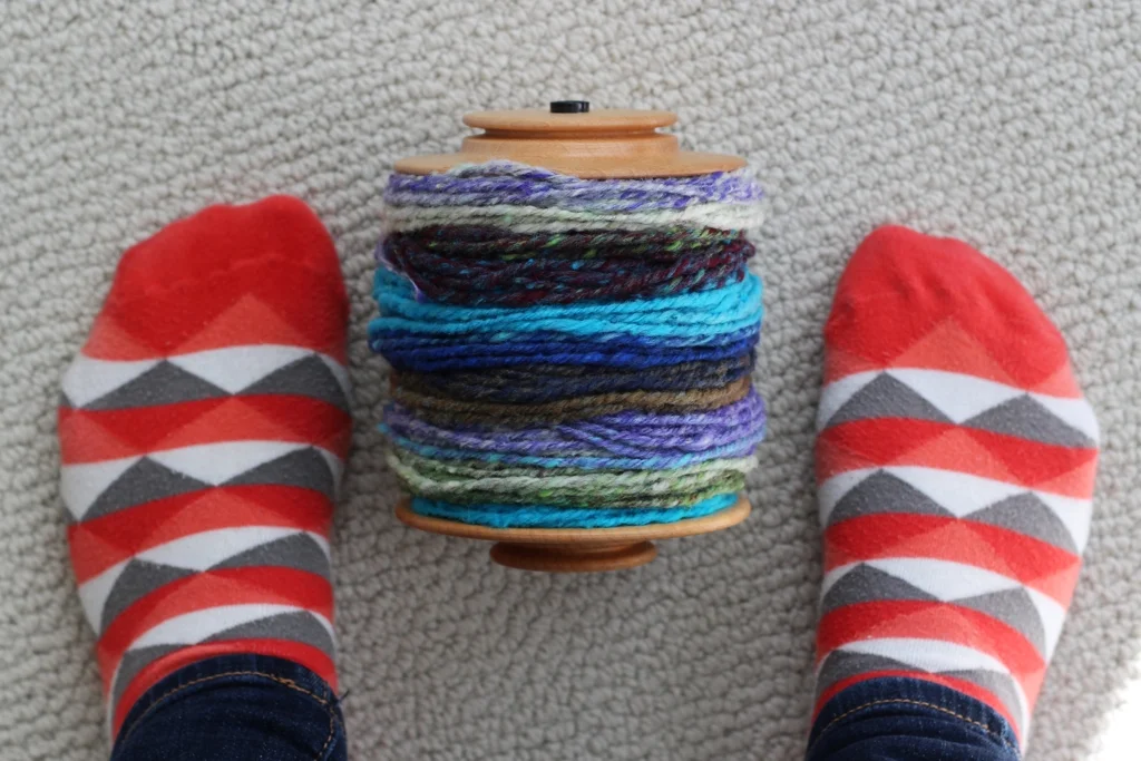 Rainbow Roll and I had a frustrating start, but we still created some beautiful handspun yarn. | Spinning Noro Rainbow Roll Part 1 - withwool.com