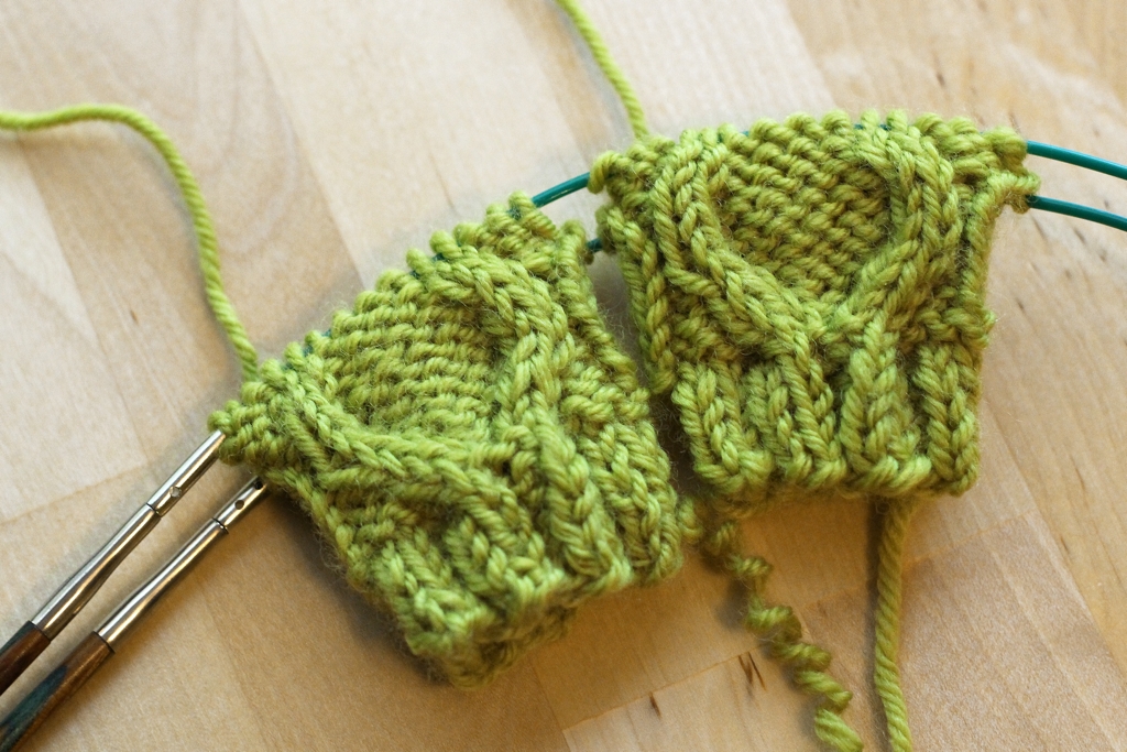 My first attempt at knitting two-at-a-time felt like wrestling an octopus. I gave it another try and decided the technique wasn’t that bad if paired with the right project. Giving 2-At-A-Time A Second Shot | withwool.com