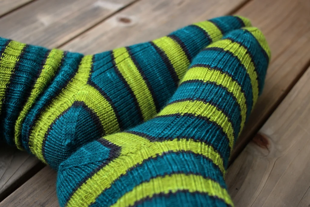 Self striping yarn knits up into great afterthought socks. This pair is going away to wait for cold snowy days. FO: TurtlePurl Socks | withwool.com