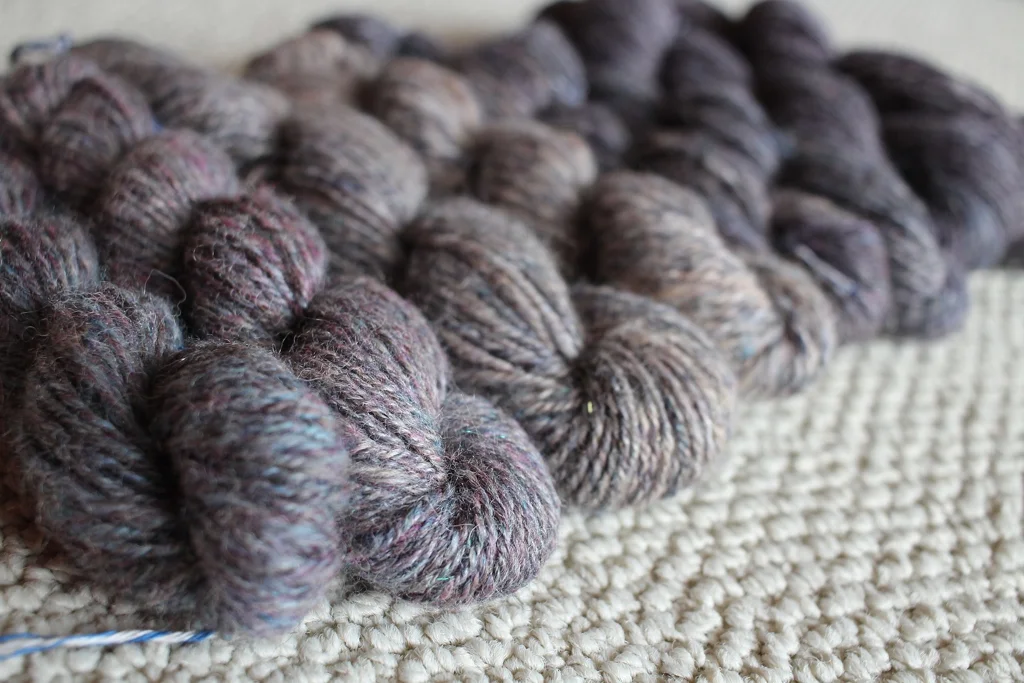 8 handspun skeins, 6 ounces of roving, and 1 beautiful color gradient. I spent almost 2 months spinning this yarn, and it was worth the effort. | withwool.com