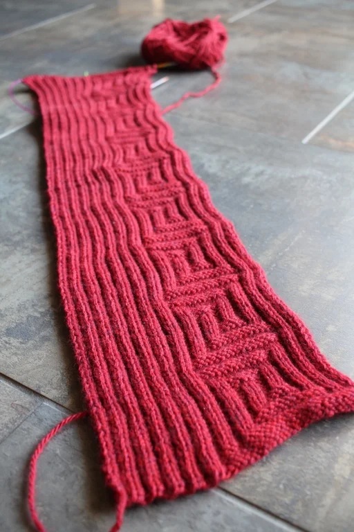Halfway finished knitting a scarf for the 2017 Red Scarf Project! | withwool.com