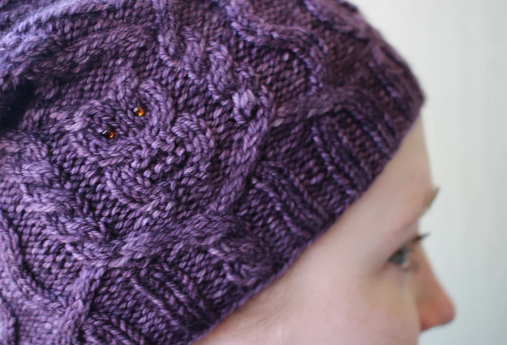 The Owl In the Thicket is my new favorite hat! Cables, owls, beads, cashmere - what’s not to love? | withwool.com