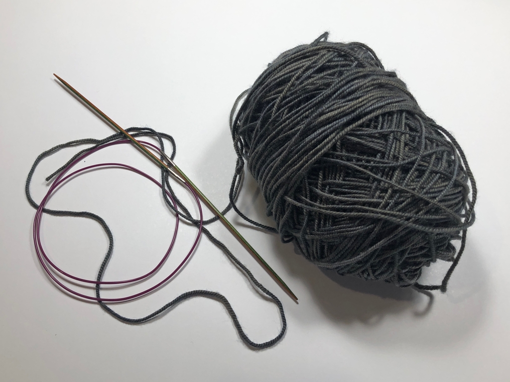 Learn how to work Judy’s Magic Cast-On to seamlessly start knitting in knit or purl. It’s a great cast-on to use for toe-up socks and other projects that start from the center out. #knitting #knittingcaston #knittingtutorials | withwool.com
