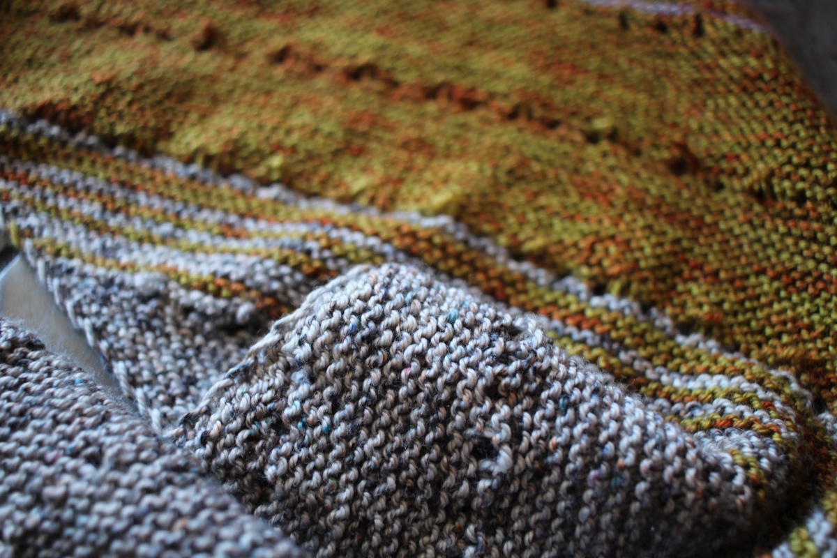 A close up view of my in progress Free Your Fade shawl with grey and green stripes. Marginalia and Spreadsheets || withwool.com