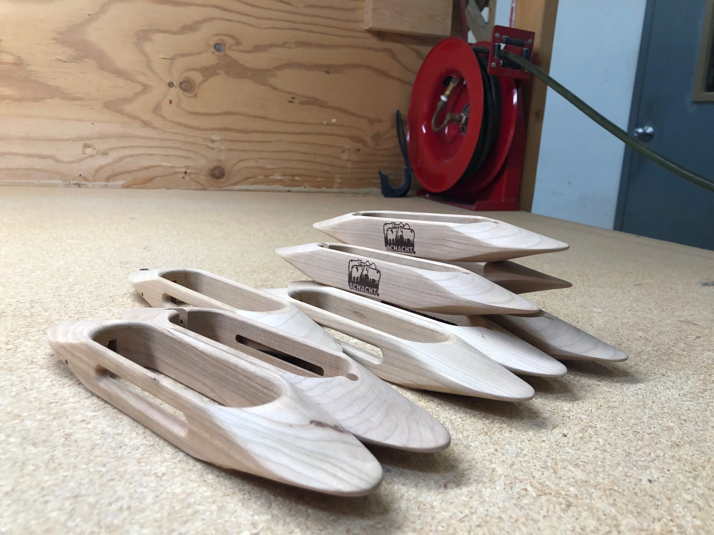 A stack of unfinished weaving shuttles. Celebrating Schacht’s 50th Anniversary || withwool.com #schacht50years