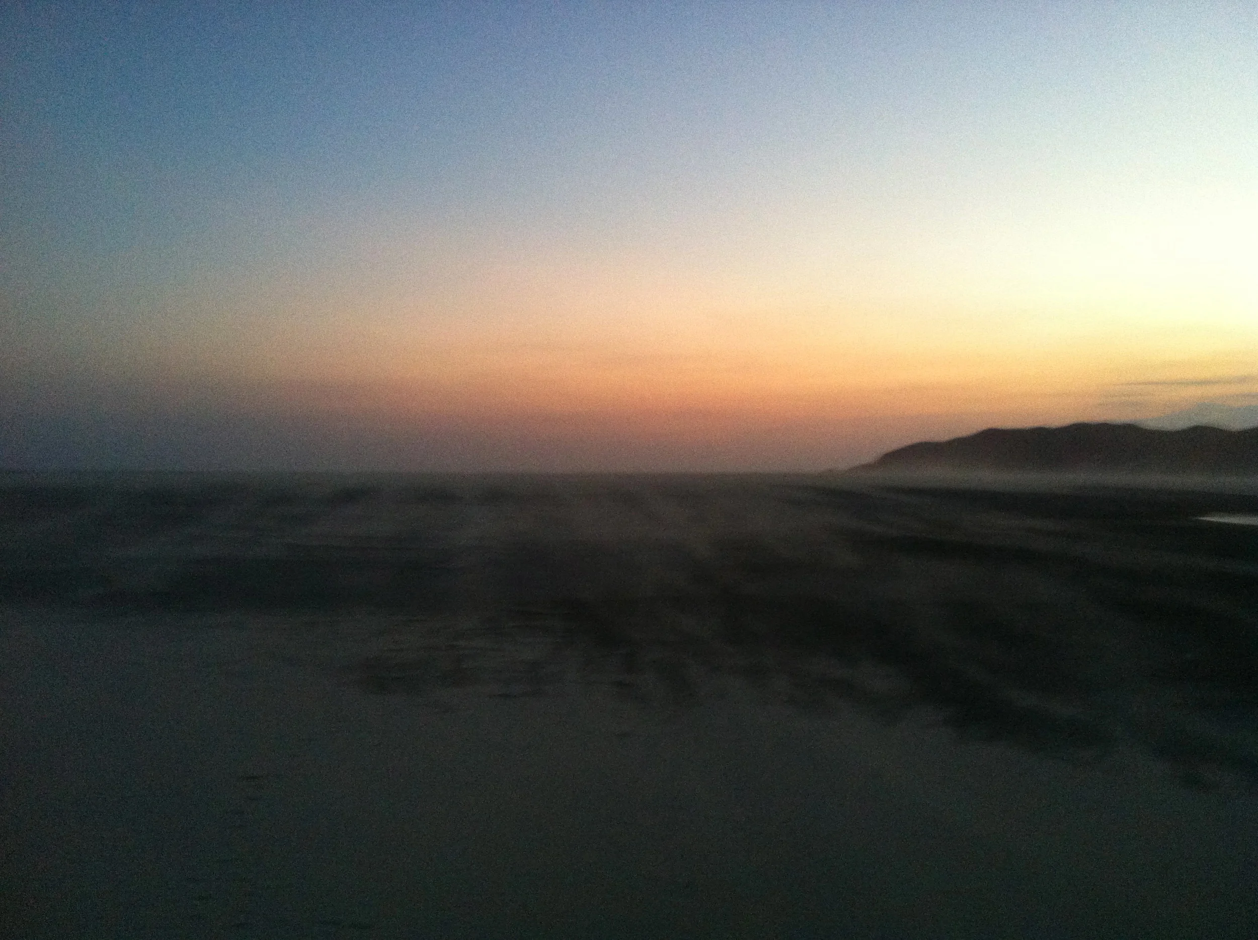 There is a turtle digging a nest in the distance…which you can't see. I so wanted to get across to it but couldn't due to the sand blasting!
