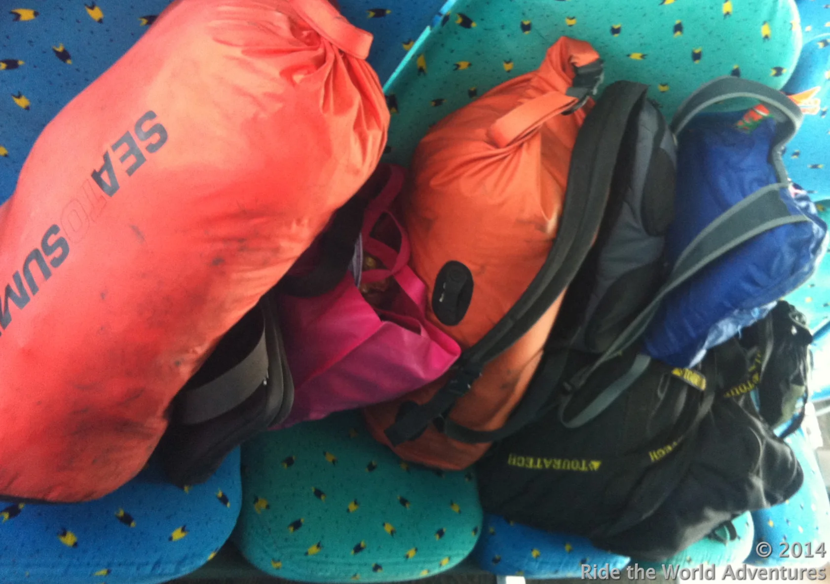 Shuffling gear without bikes can be cumbersome when you do not have suitcases! On the passenger ferry crossing over to Cancun.