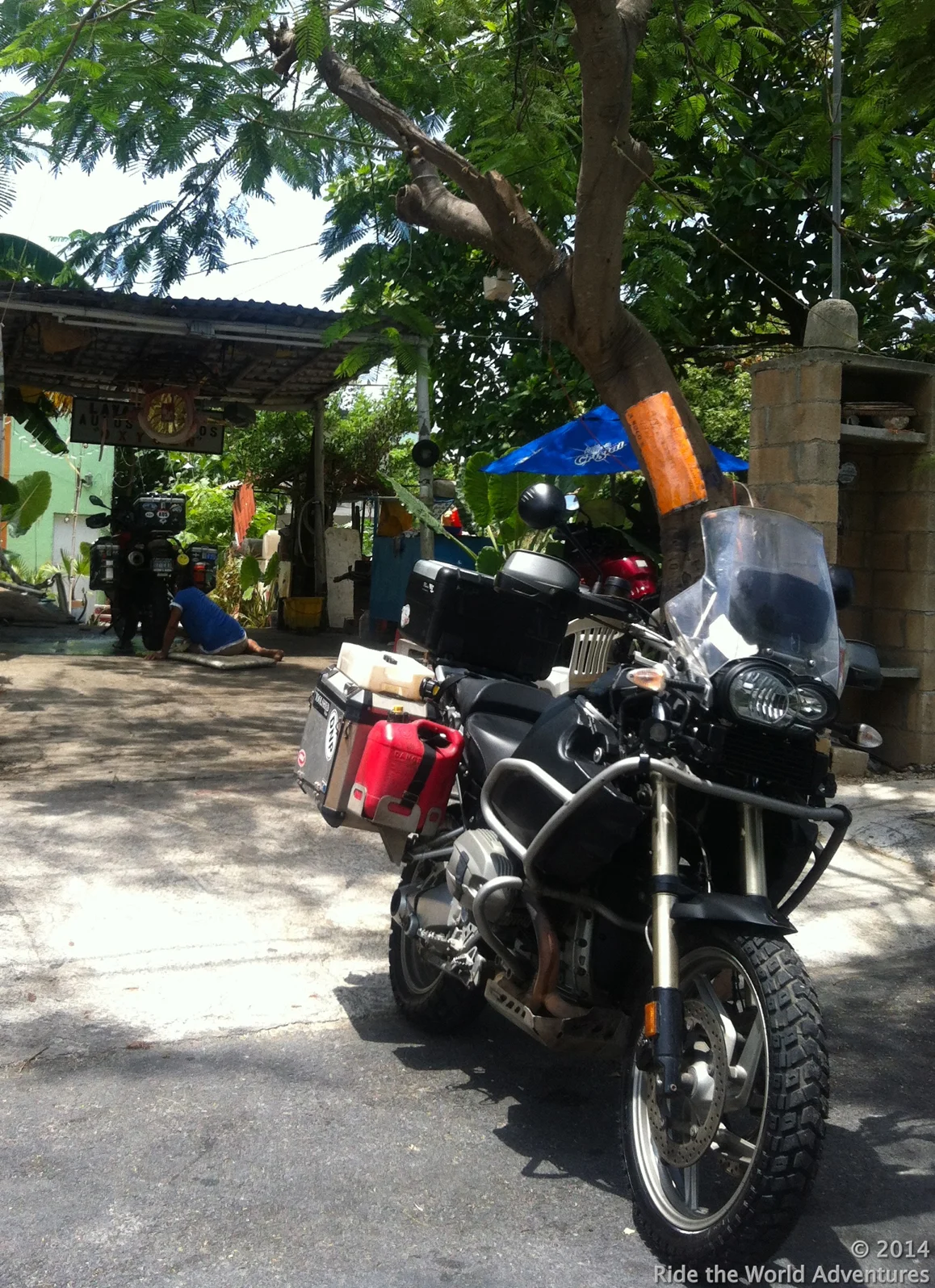 Bikes getting a thorough wash at the " lavado de autos"