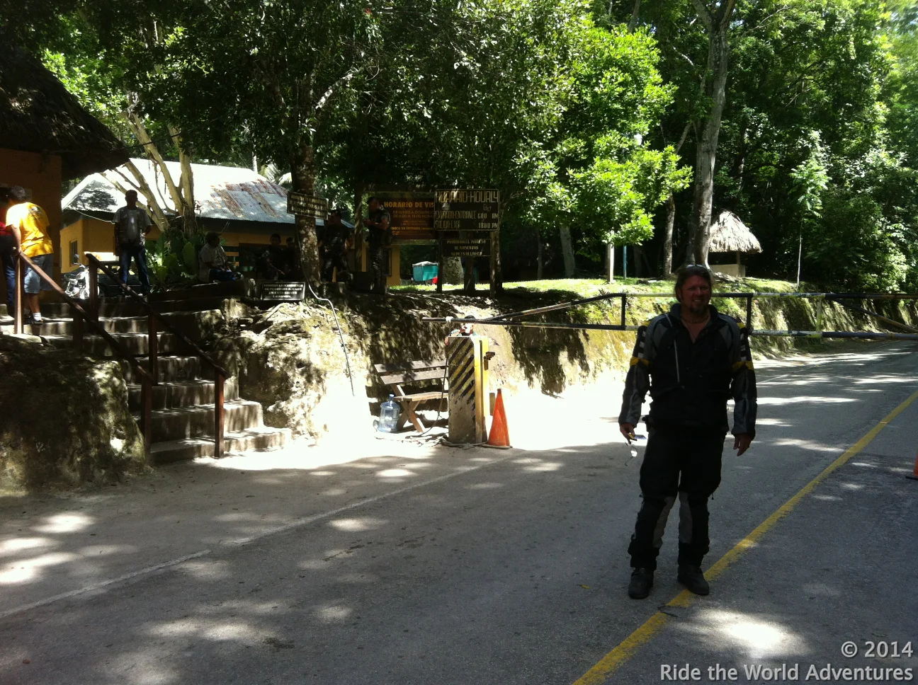 Kev walking back to his bike after paying the entrance fee.