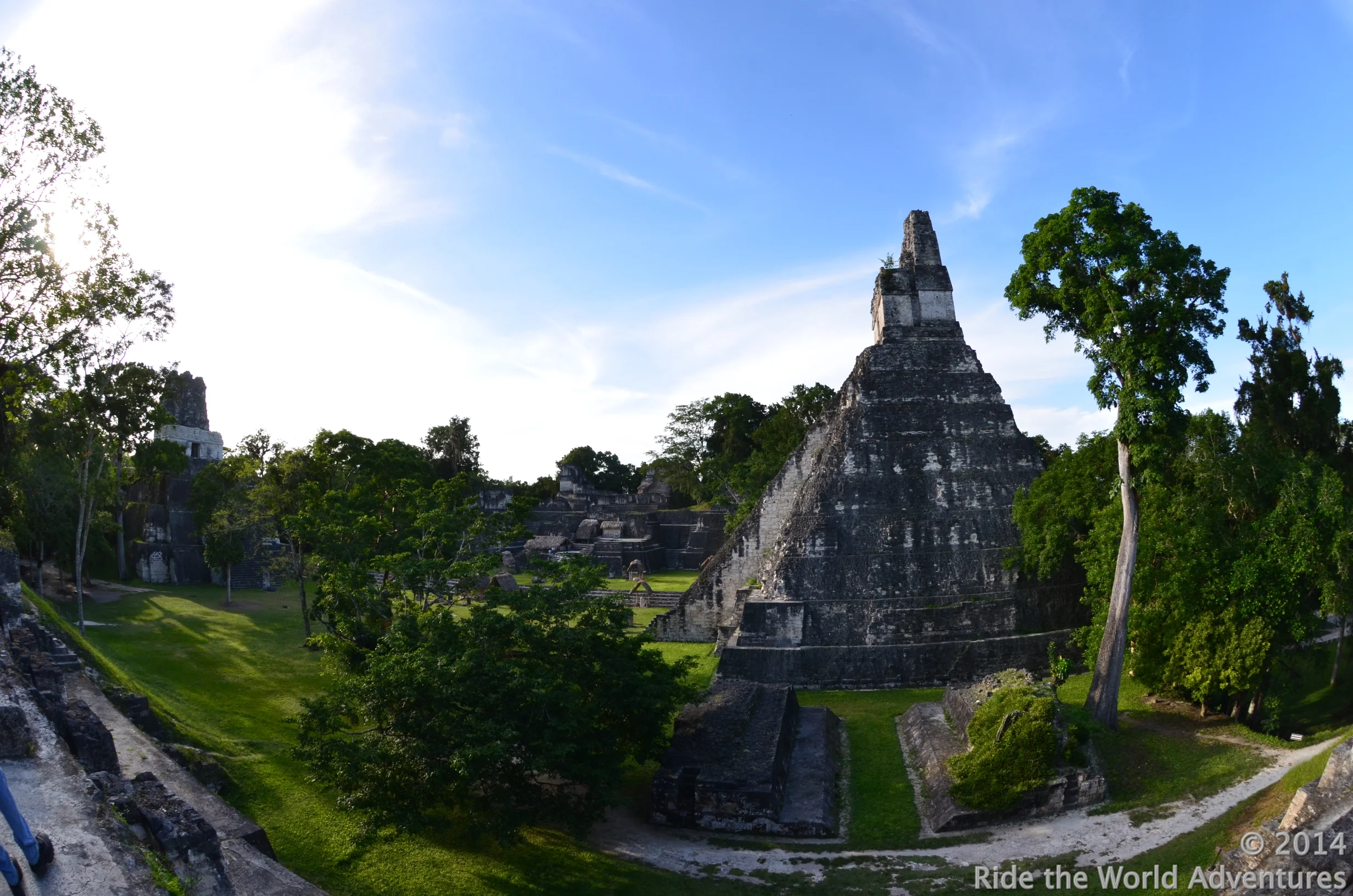 A shot from the Central Acropolis over looking the Grand Plaza. The temple on the right is the Great Jaguar Temple. This temple built around 700 A.D is Guatemala's landmark to the world.