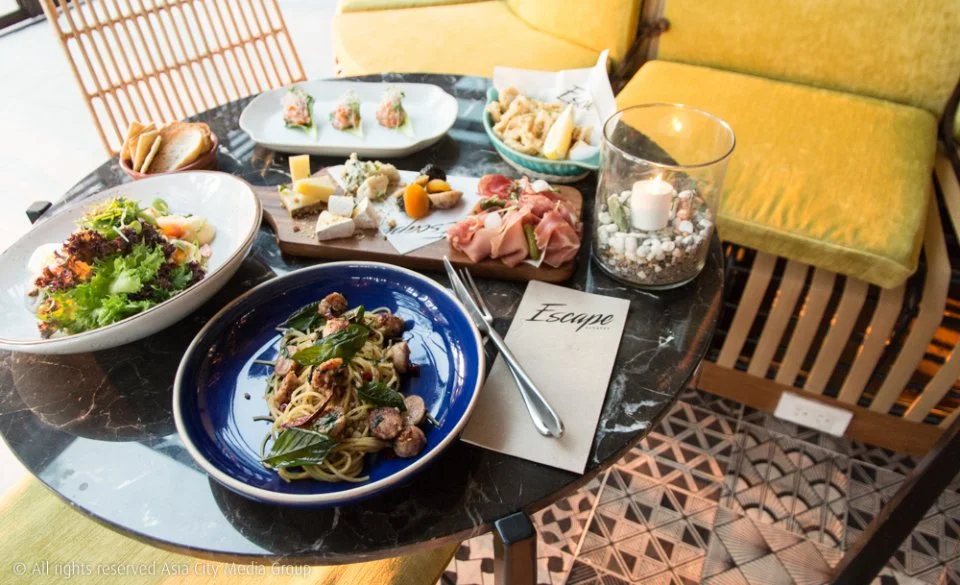 EmQuartier mall's rooftop bar goes for “downtown beach club” vibes.