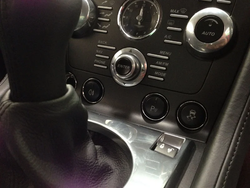 The genuine park assist button will control the Automotive Integration retrofit system. 