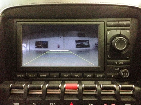 The reference grid allows the driver to gauge the distance behind the vehicle.