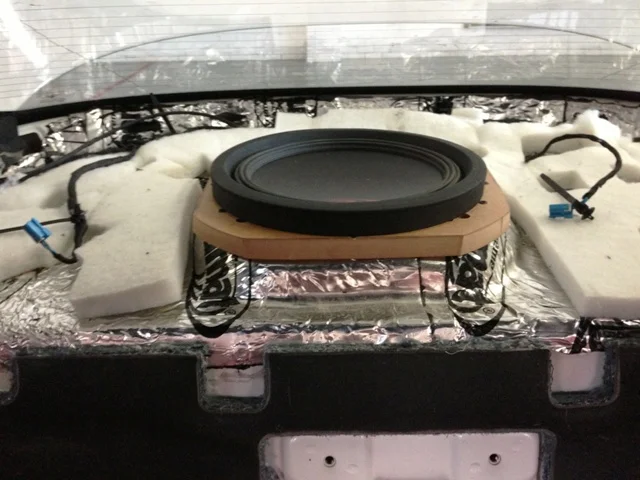 Rear parcel shelf is sound deadened and reinforced with a MDF support ring.