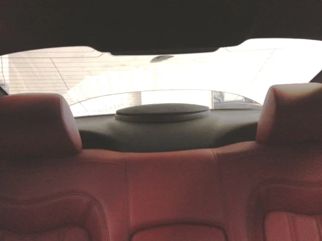 The rear shelf retains a factory look hiding the upgrades.