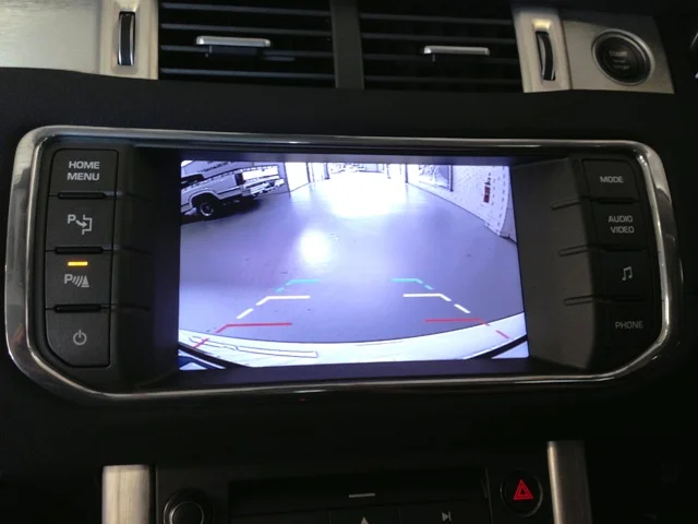 The wide angle rear view camera auto switches in reverse.