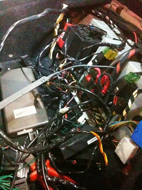 The before shot of the fuse box in the F430. It was distressing to see such a beautiful car treated with such contempt.