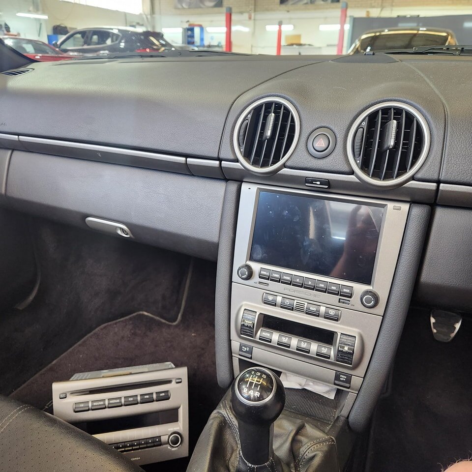 Some might look at this and just see another 987 Boxster receiving a radio upgrade, but we adore this car because we feel it represents our relationships with our clients. We've been doing work for the owners of this car for over a decade, and every 